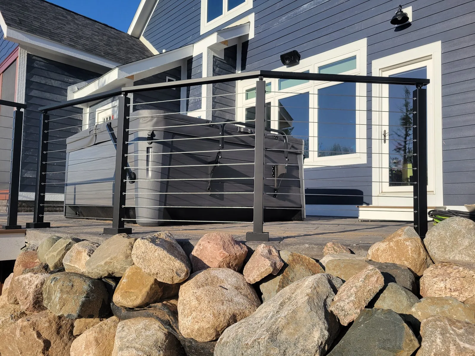 Cable railing on patio deck in Star Township MI