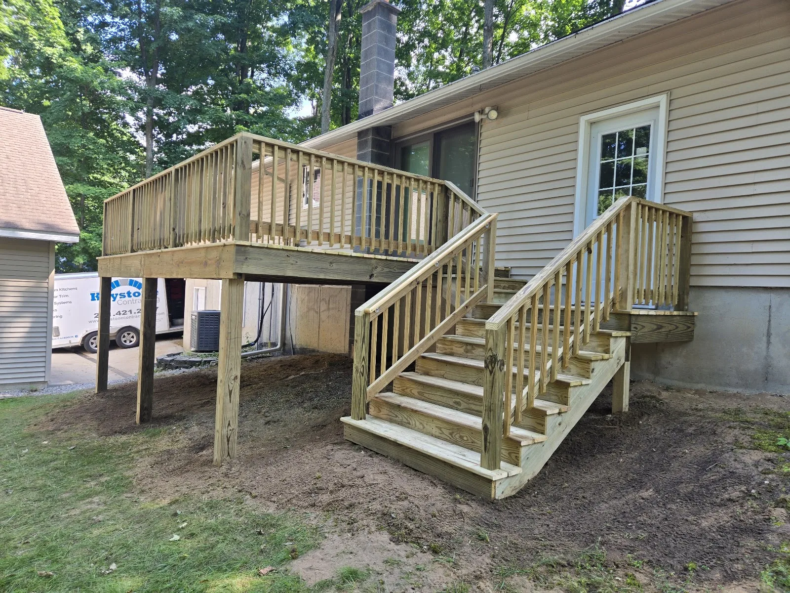 Elevated wood deck built in Ellsworth Township MI
