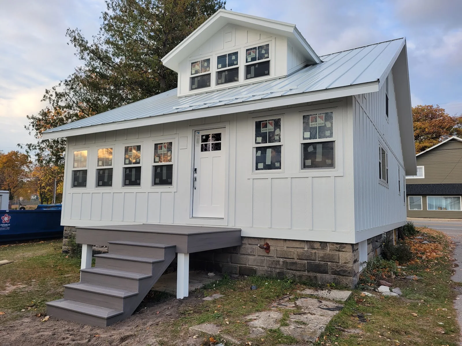 Grey composite entry deck in Echo Township MI